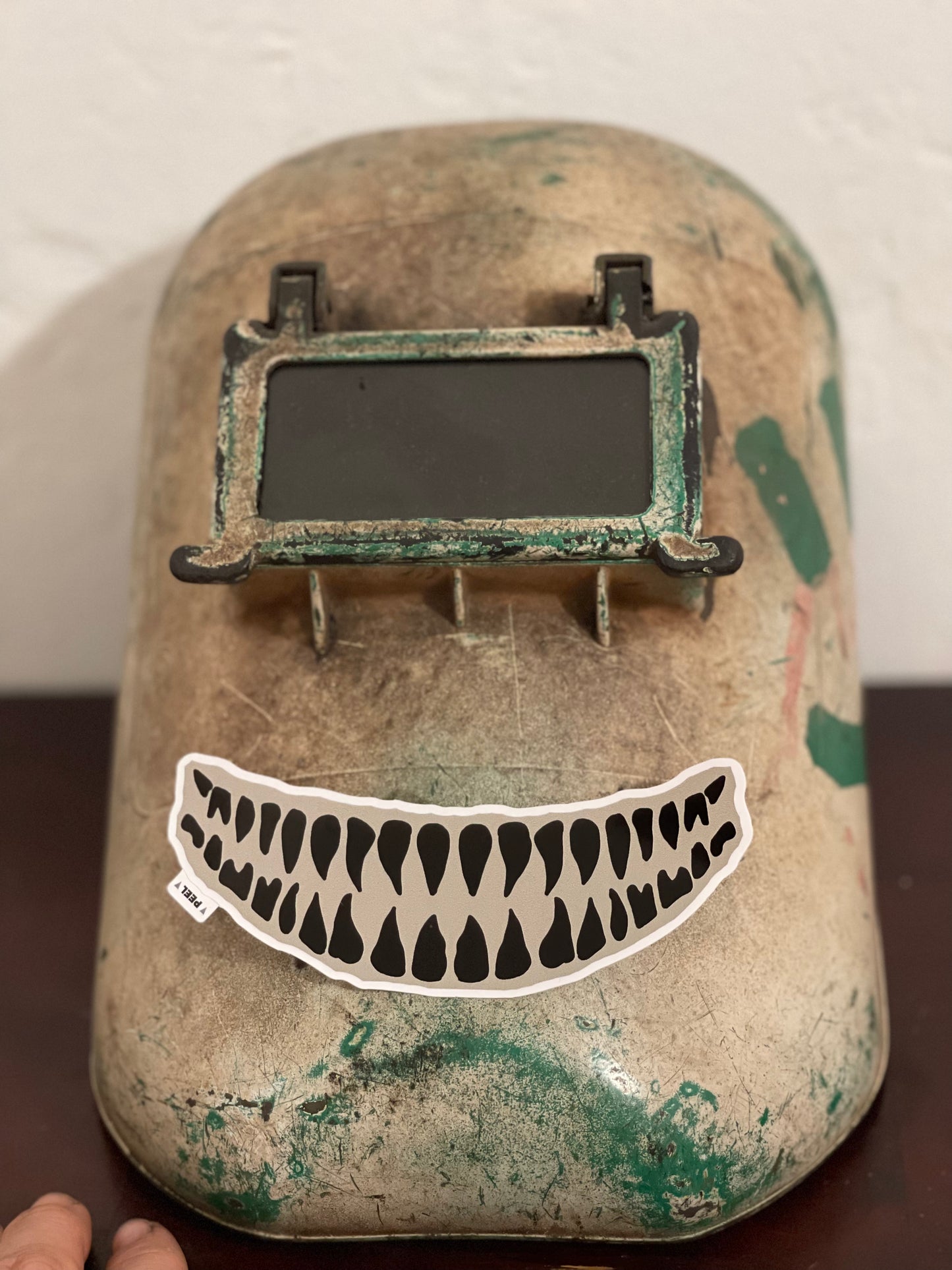 Welding sticker creepy smile