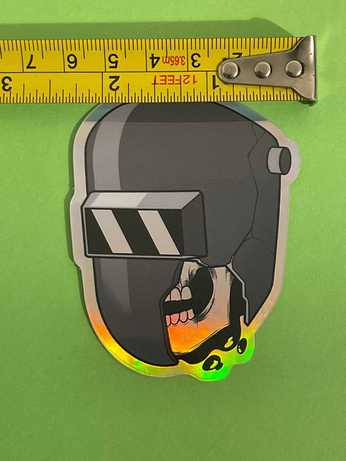 Shattered welding hood with skull holographic sticker