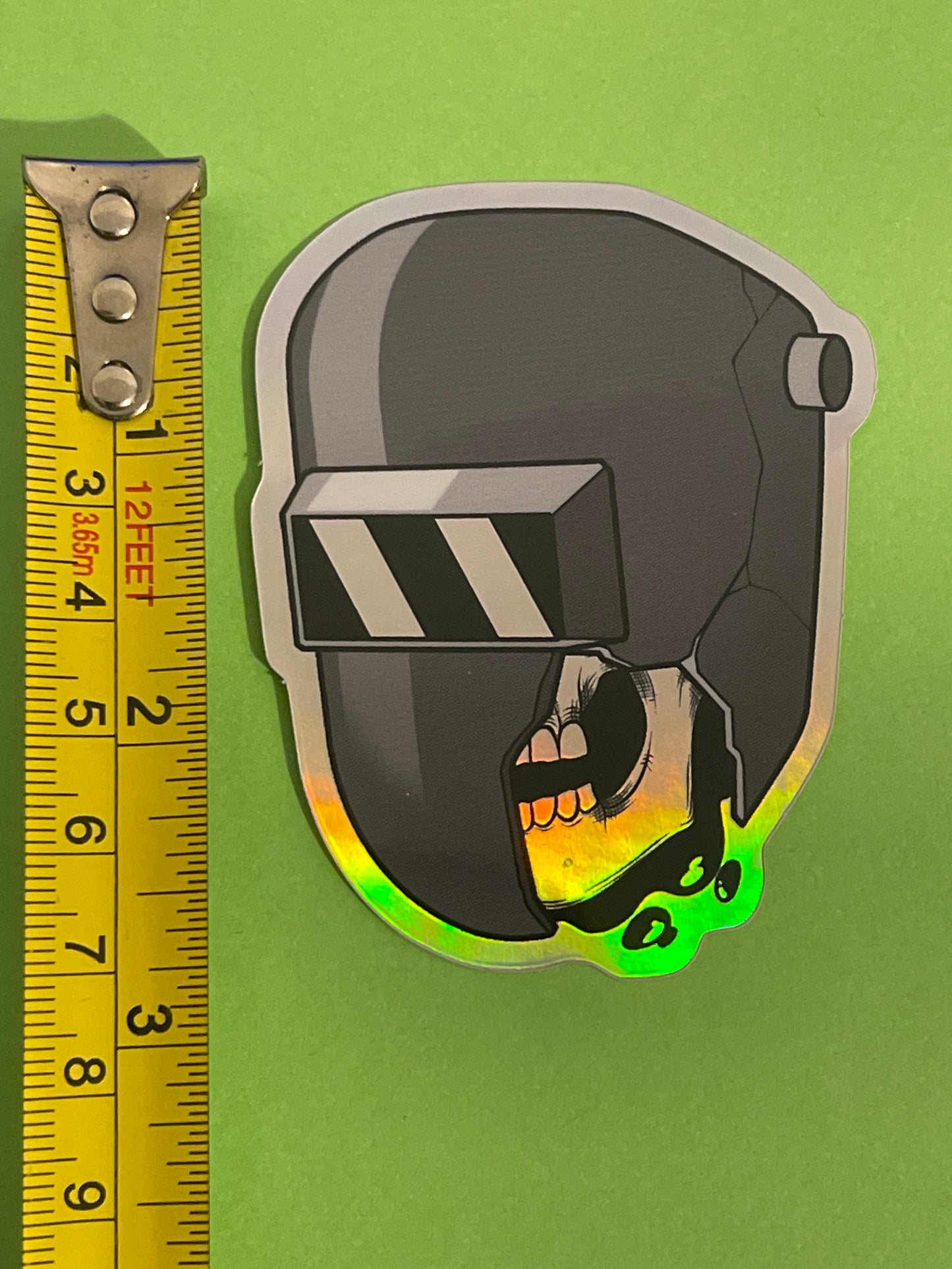 Shattered welding hood with skull holographic sticker