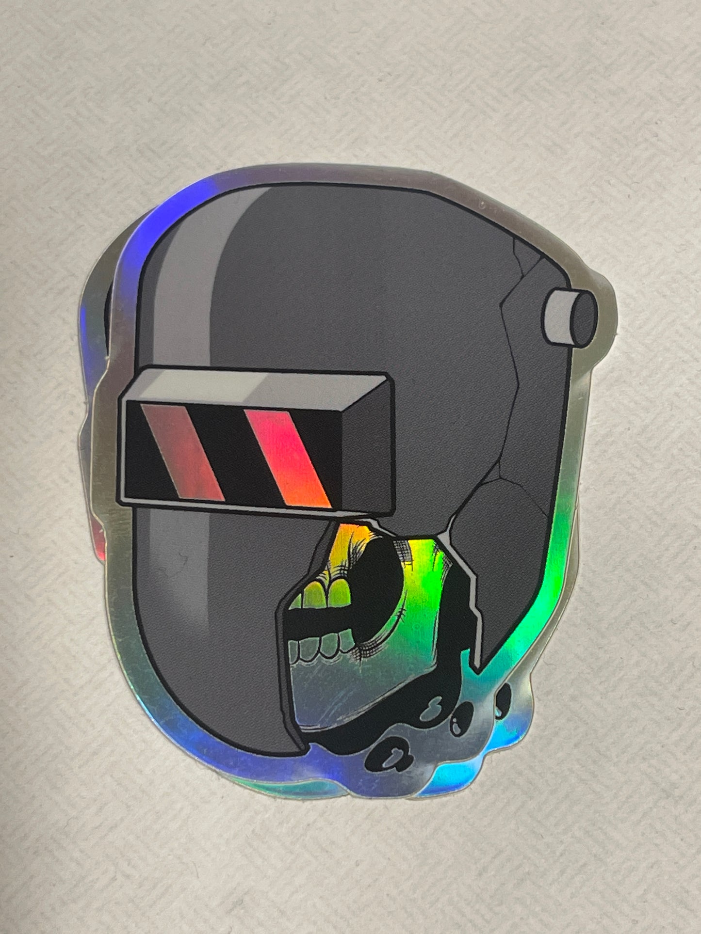 Shattered welding hood with skull holographic sticker