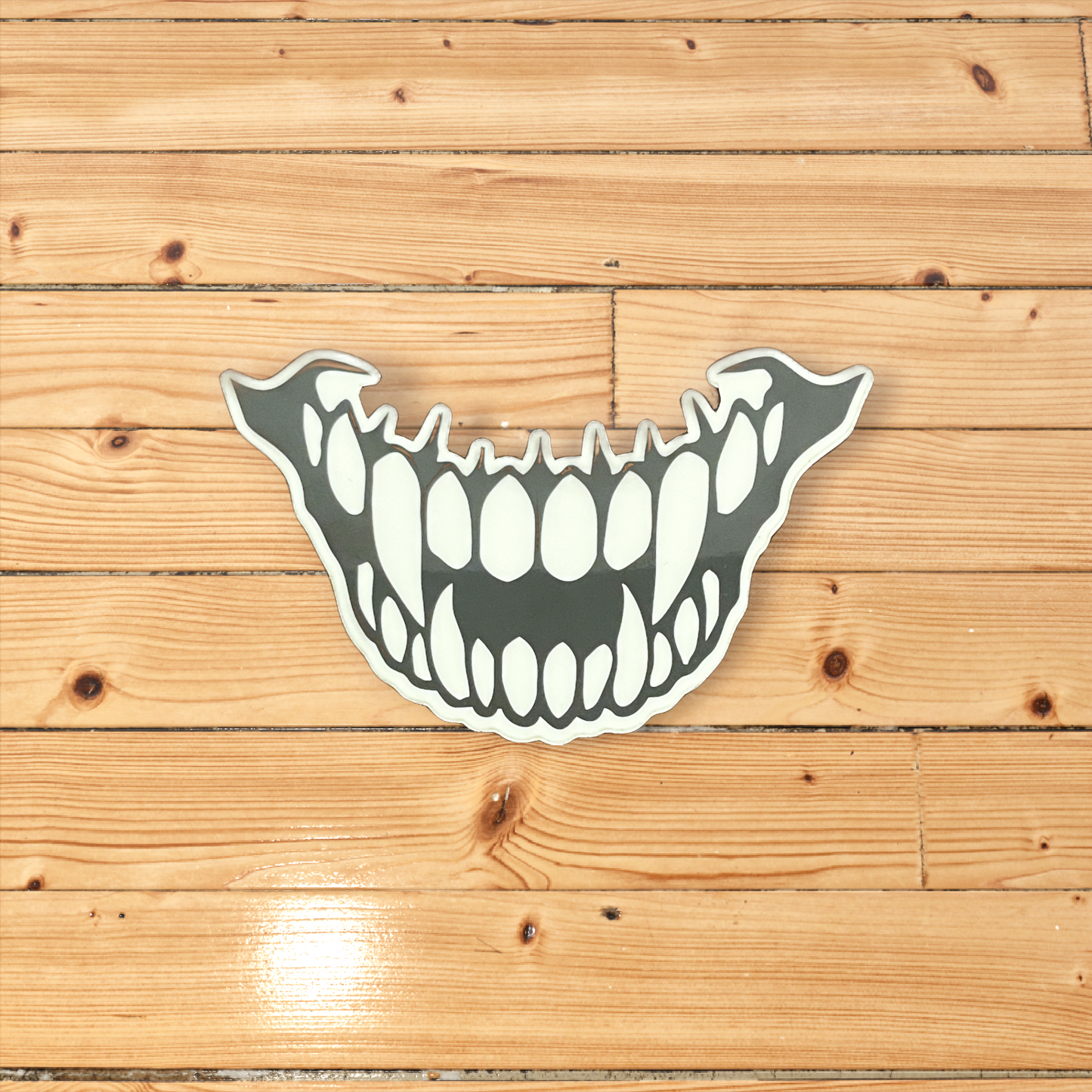 Glow in the dark creepy smiley face sticker