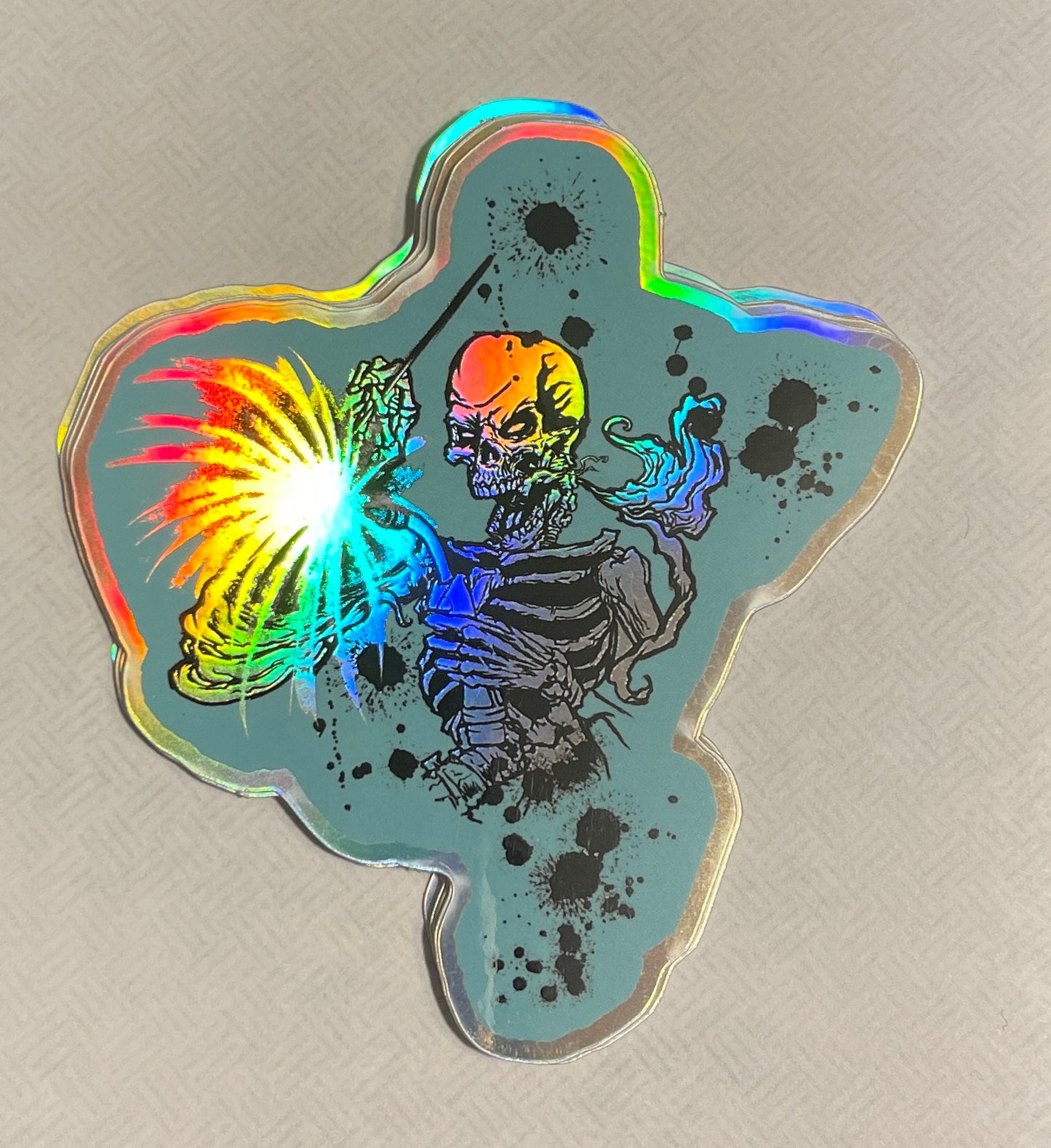 Holographic die cut skeleton welding sticker with blue background